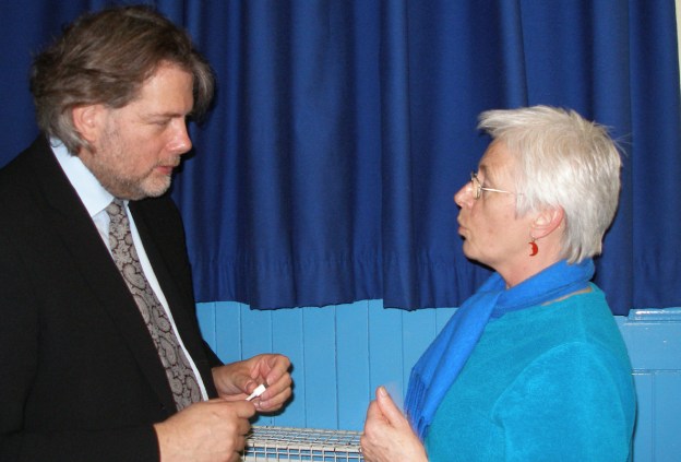 A local resident and cyclist talks with city design leader Riccardo Marini